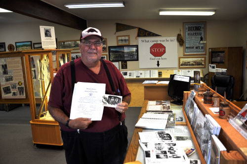 Randy Ross with father's CCC Discharge Papers