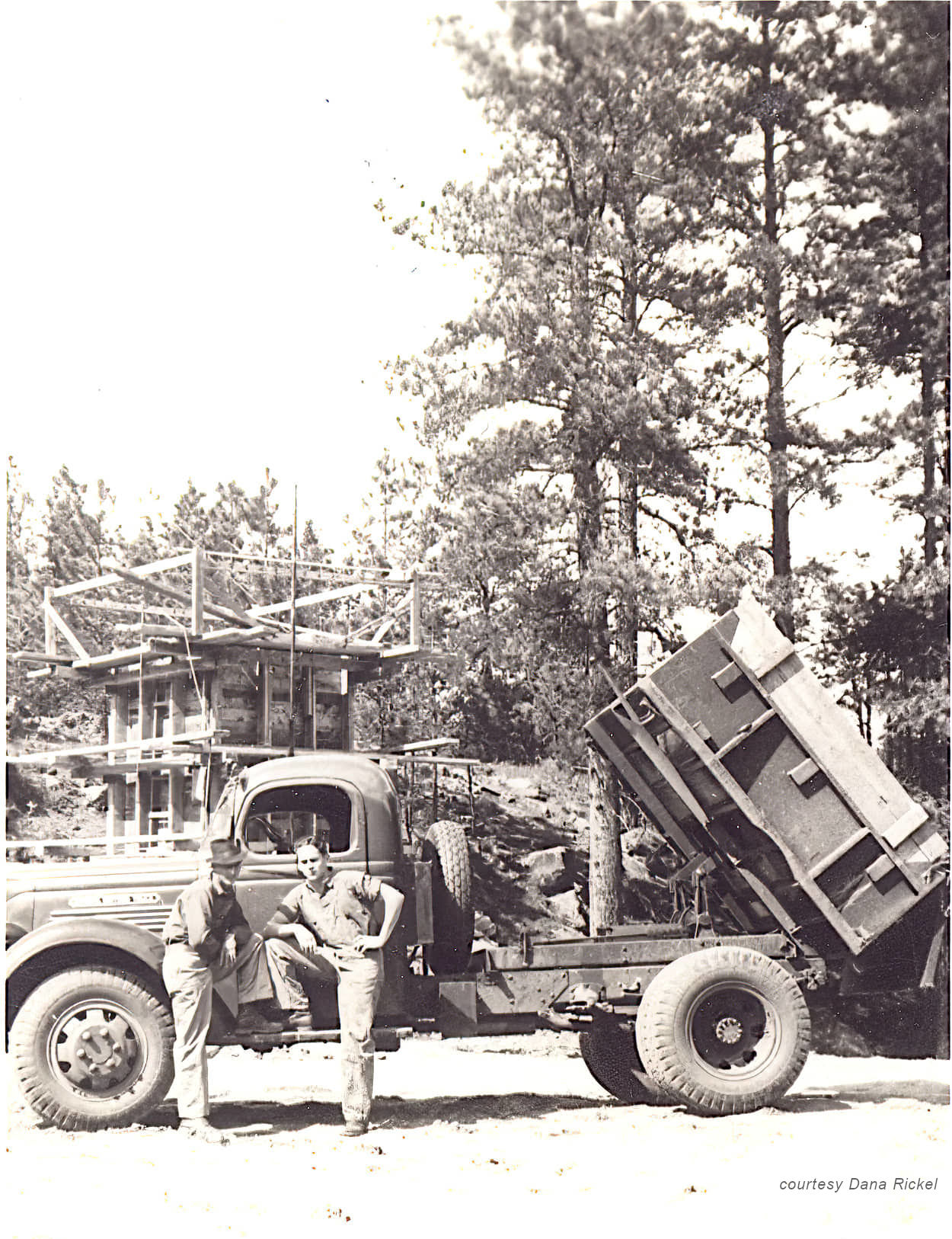 2 men with CCC truck