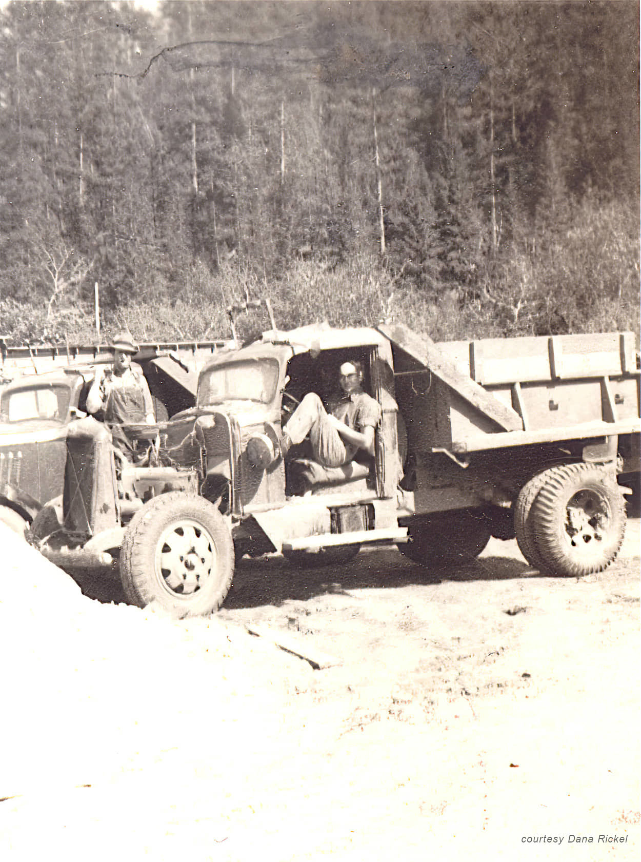 Truck and men at Mitchell Dam, SD