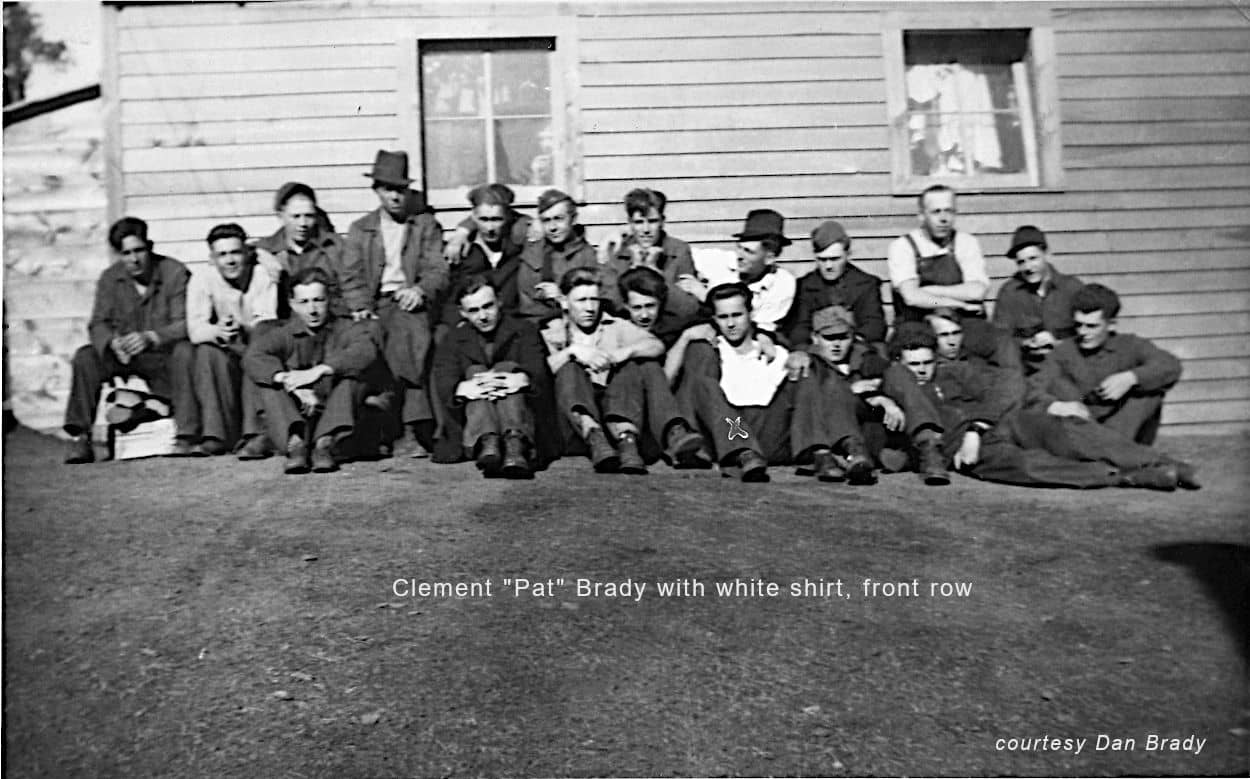 Brady with white shirt, front row