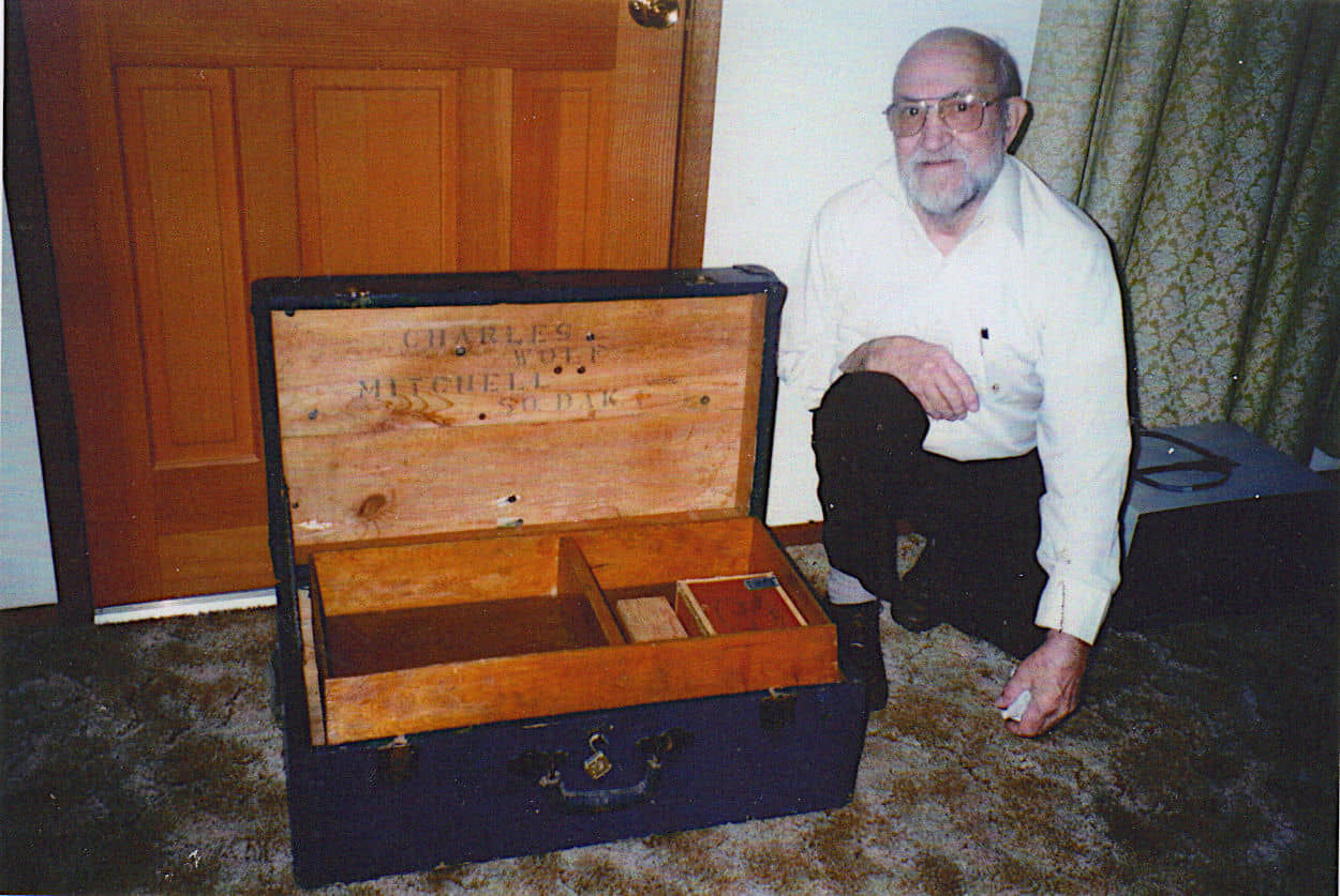 Charles Wolf with footlocker