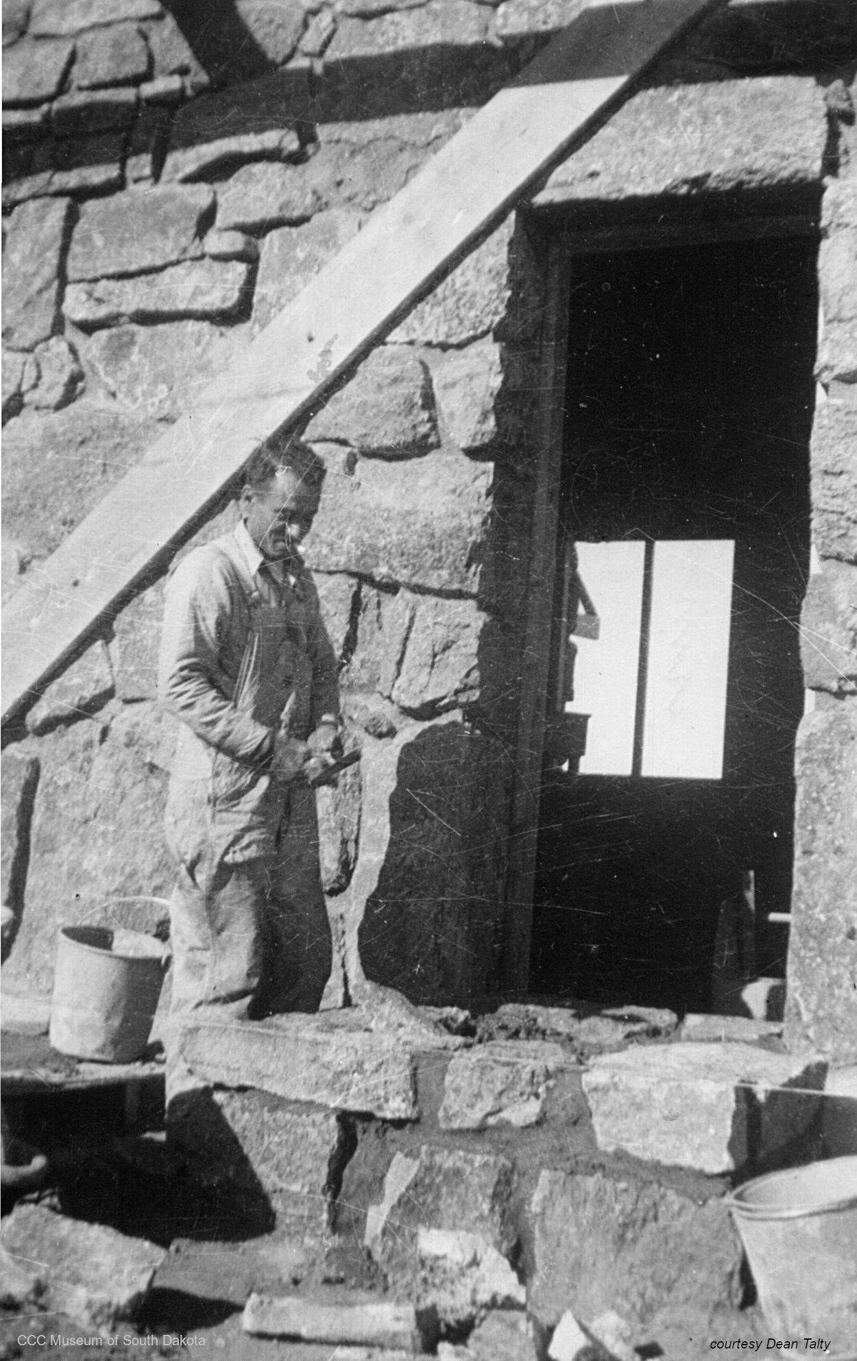 Man and Stone Work