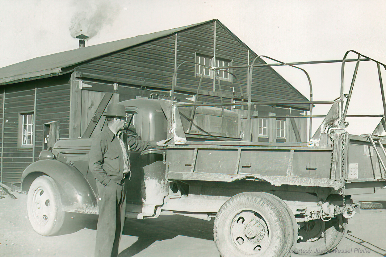 Man stading by truck