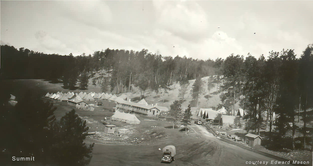 buildings tents truck at Camp Summit