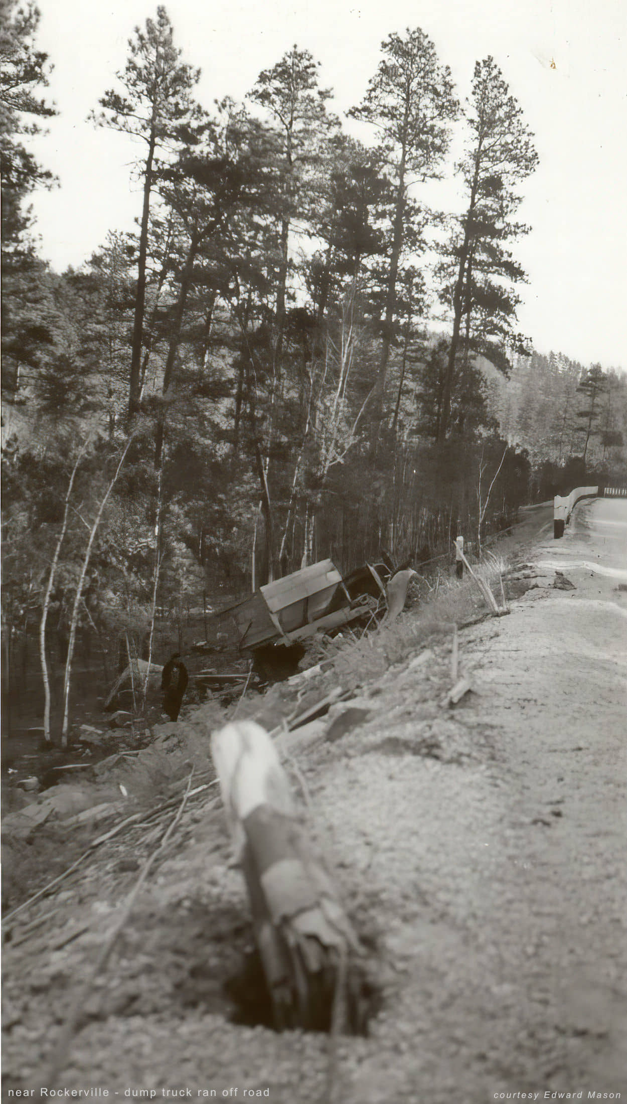 dump truck ran off the road