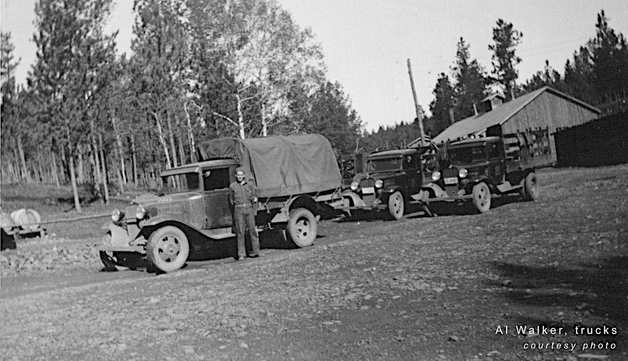 Al Walker standing by CCC trucks Al Walker standing by CCC trucks