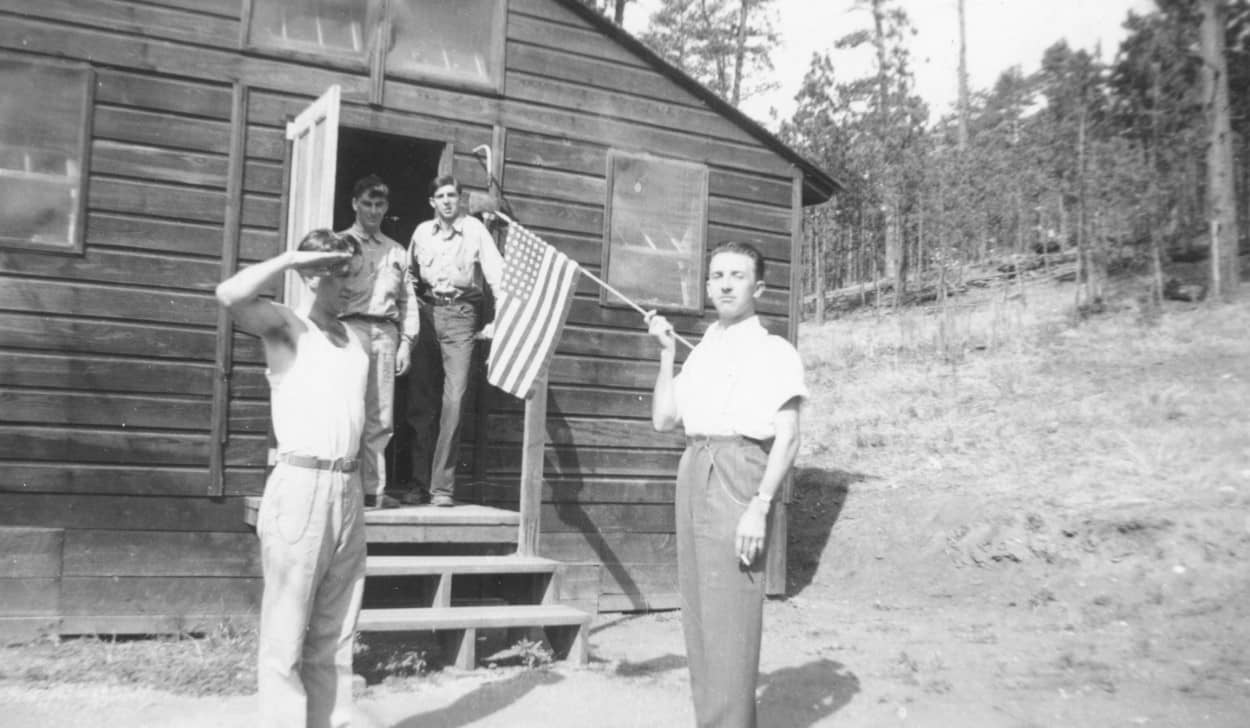 saluting hand held flag