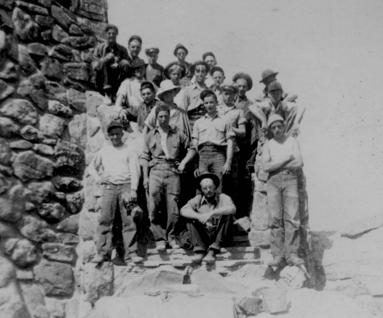 crew at Harney on steps, close up