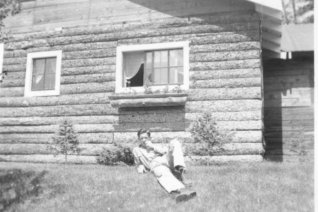 man reclining on lawn