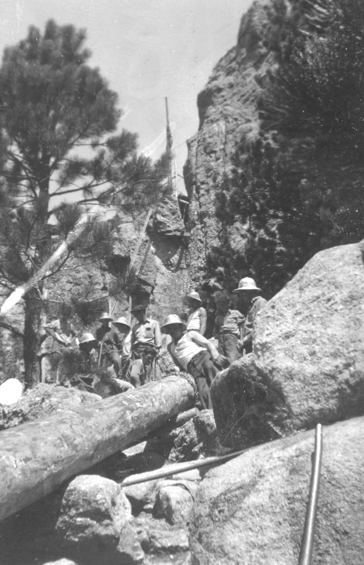 men working on Harney Peak